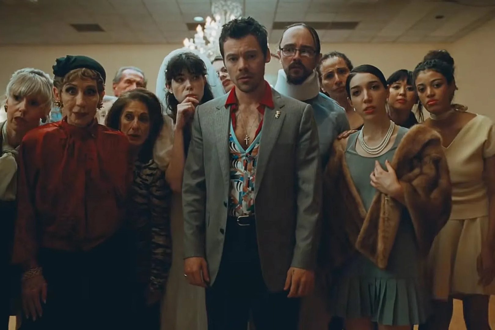 Harry Styles Dances Through His Differences With a Group of Strangers in ‘Coming Up Roses’ Video